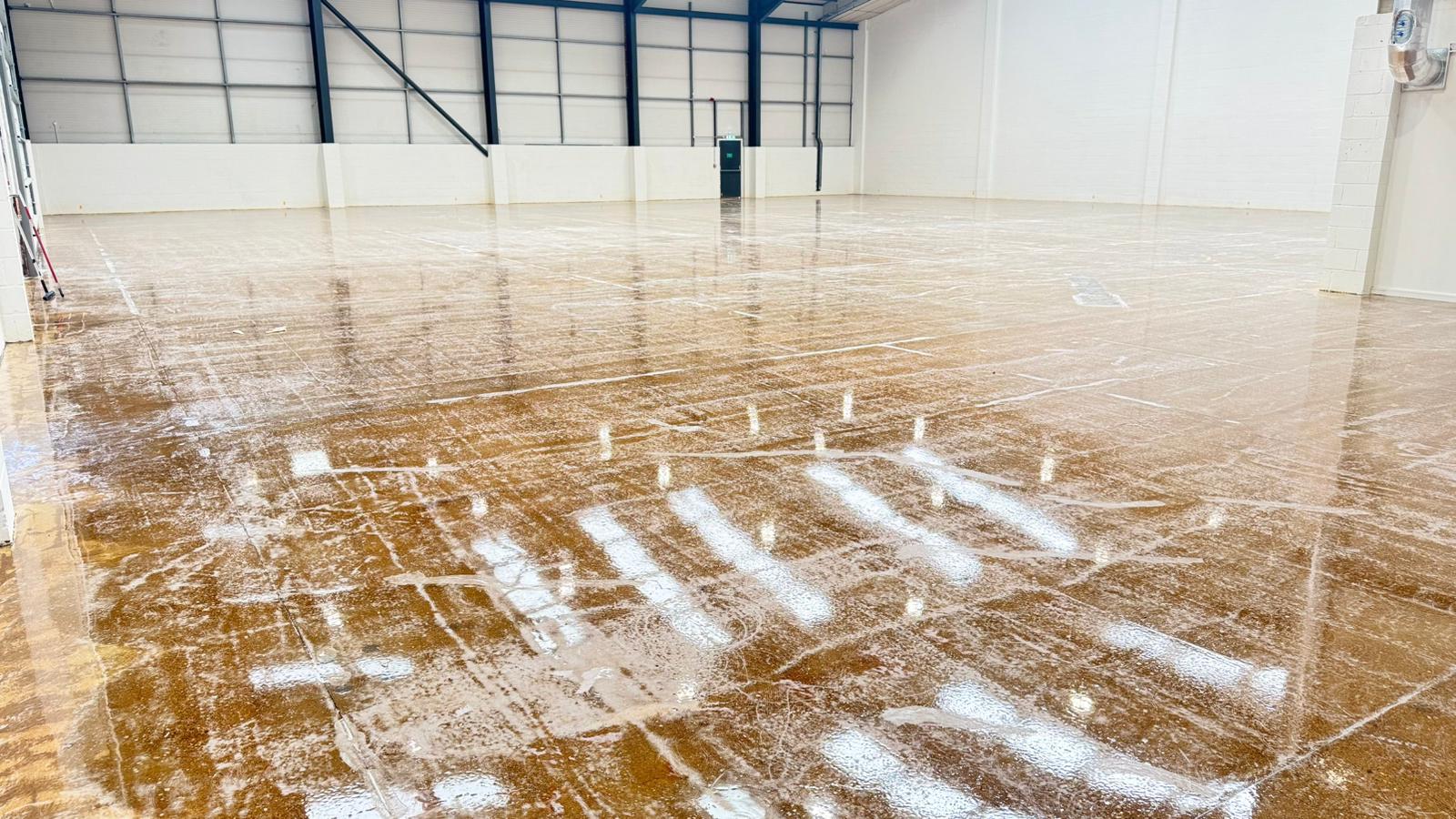 MT 100 from Remmers an Epoxy primer having been installed on this mechanically prepped floor at a warehouse in Shrewsbury